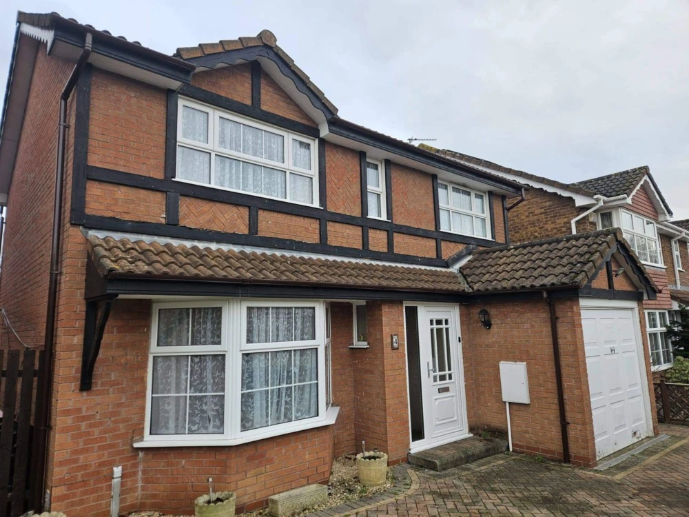 Guttering system replacement along roofline